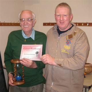 The monthly winner Bernard Slingsby received his certificate from Tony Handford